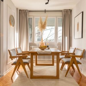 Bright dining room in beige tones without people