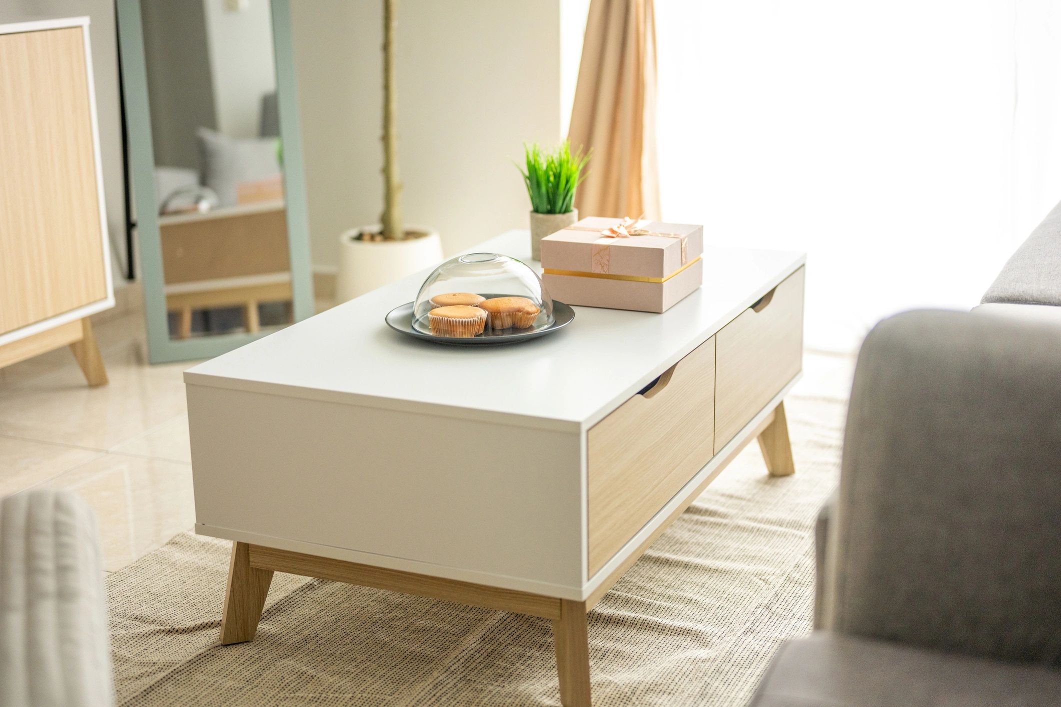 Contemporary living room with grey sofa and coffee table